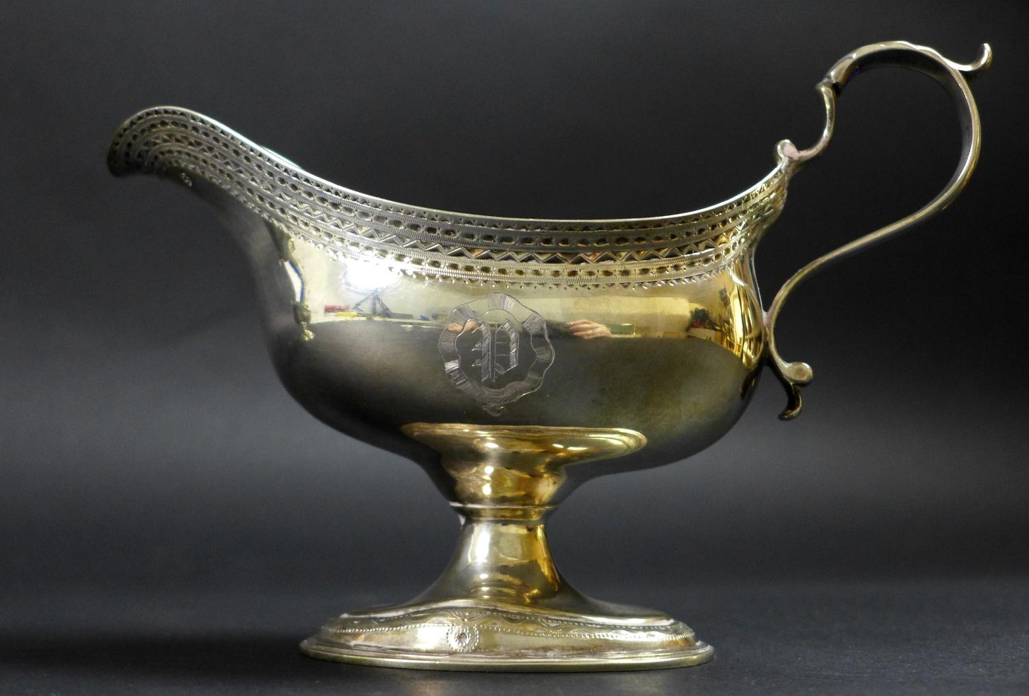 A pair of George III silver pedestal sauce boats, with bright cut decoration and engraved with the - Image 3 of 9