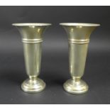 A pair of Queen Elizabeth II silver vases, with weighted bases, 7.3 by 13cm high, Joseph Gloster