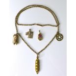 A 9ct gold necklace with three charms formed as Jewish religious items, together with two loose