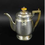 A George III silver coffee pot, of plain design with horn handle, armorial engraving on both