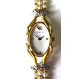 A Carrera y Carrera 18ct gold and diamond lady's dress wristwatch, oval mother of pearl dial with