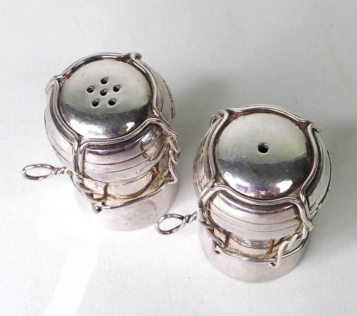 A pair of contemporary silver novelty salt and pepper pots, modelled as champagne corks, AD, - Image 2 of 5