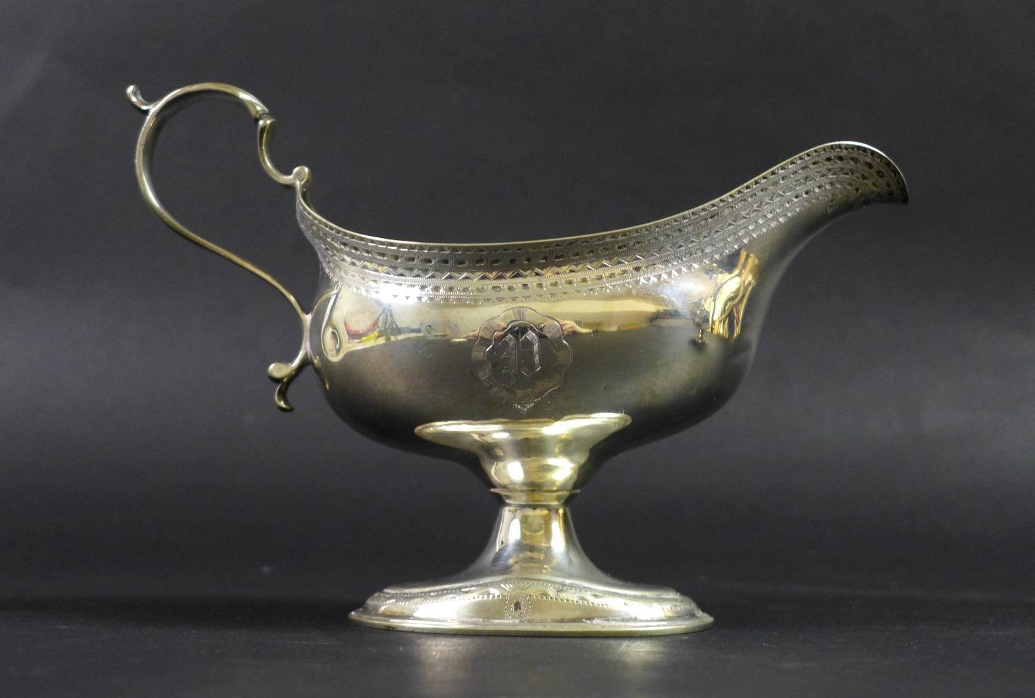 A pair of George III silver pedestal sauce boats, with bright cut decoration and engraved with the - Image 2 of 9