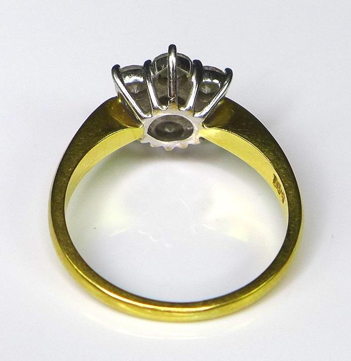 An 18ct gold and diamond flowerhead ring, the seven diamonds each of approximately 0.15ct, total - Image 4 of 5