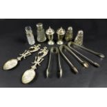 A group of silver items including a pair of Mexican silver mounted pepperettes of octagonal form,