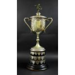 A silver plated Derby Wednesday Football Challenge Cup, with silver winners' shields around a