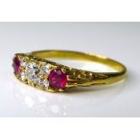 An 18ct gold, diamond and ruby ring, of Georgian style, the central brilliant cut diamond of