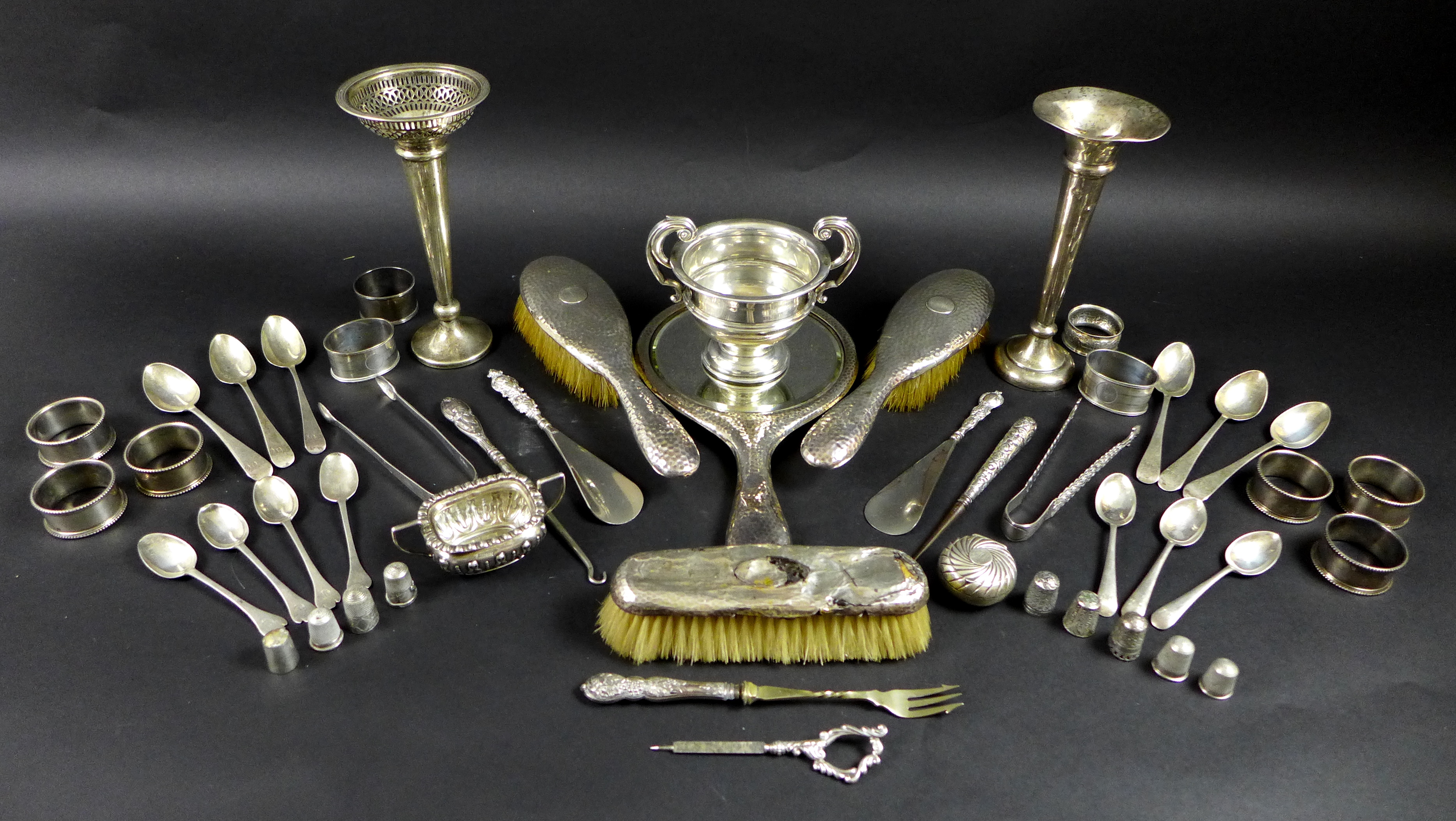 A group of silver items, including an Edwardian twin handled cup, possibly C & Co, Birmingham