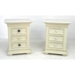 A pair of modern cream painted bedside cabinets, each with three drawers, 48 by 38 by 83cm high,