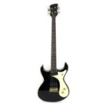 A Gould four string electric bass guitar in black, with rosewood fingerboard, white pick guard,