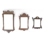 A group of three Georgian silhouette framed mirrors, the largest with walnut frame and gilt mount,