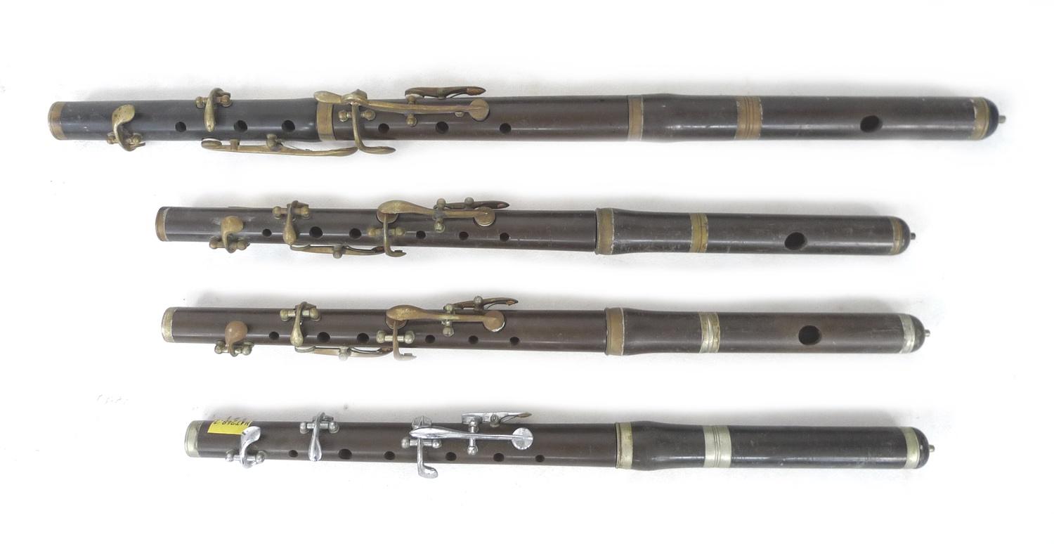 A cased USA made Encore clarinet with accessories and four marching flutes, including one by Rose- - Image 3 of 3