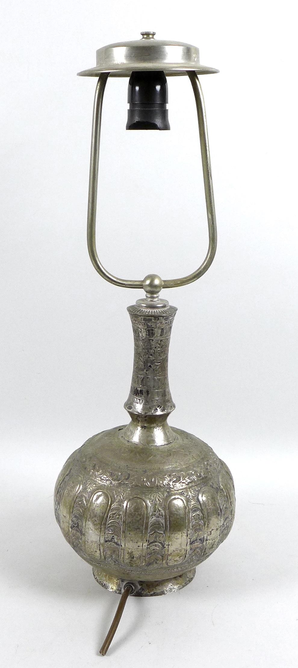 A white metal or brass silvered bottle vase, likely 19th century Indian the gourd form base - Image 4 of 5