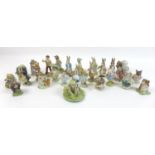 A large collection of Beswick and Royal Albert Beatrix Potter figurines, comprising Johnny Town