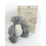 A limited edition Steiff Koala teddy, in ash grey/white, edition 844/2000, with growler, 40cm