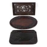 A group of three Oriental hardwood trays, comprising a Chinese tray with inlaid mother of pearl