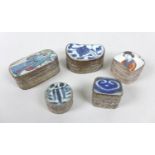 Five trinket boxes with lids inlaid with pieces of Chinese ceramic, including a rectangular form box