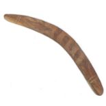 An Australian Aboriginal boomerang, mid 20th century, likely stone or tooth tula carved, and with