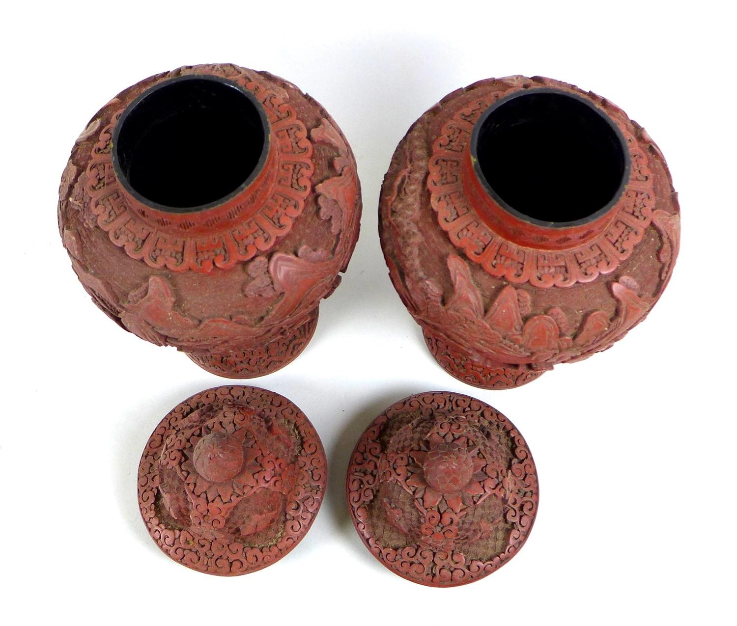 A pair of Chinese covered vases, likely red resin, early to mid 20th century, made to resemble - Image 3 of 5