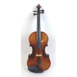 A 20th century 'Antoni' violin with bow and fitted case.