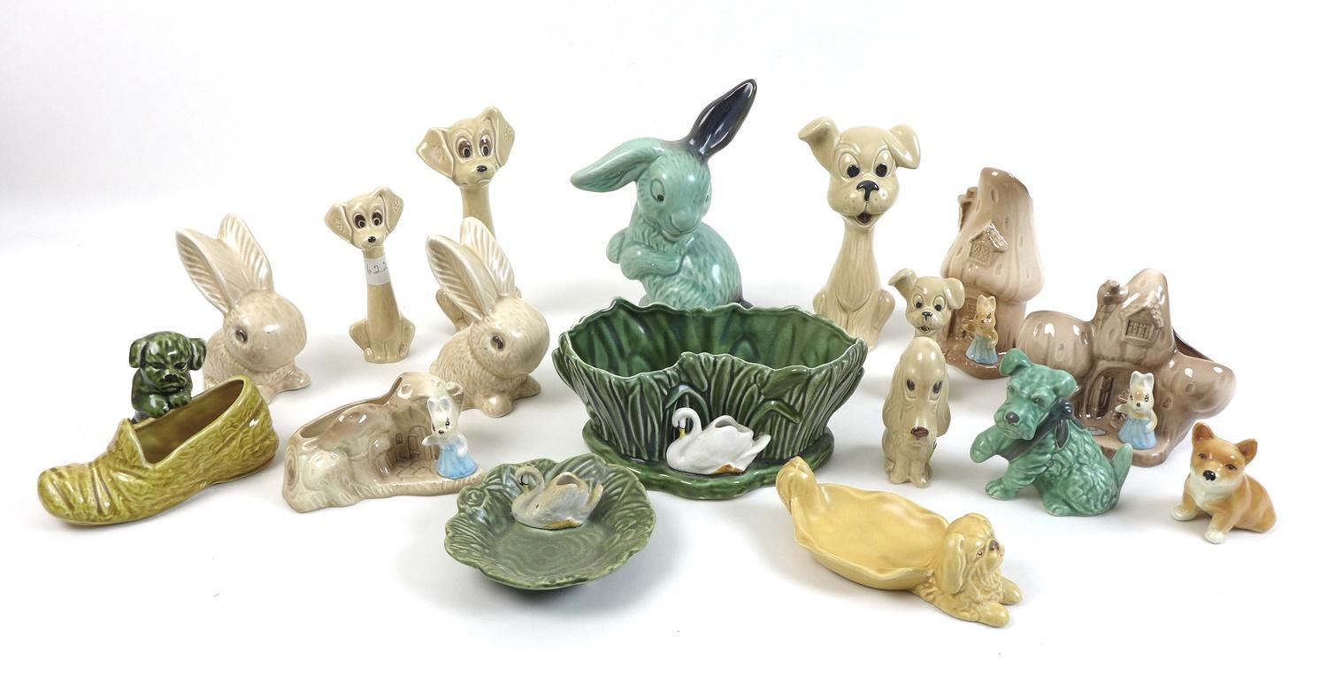 A group of Slyvac figurines, including dogs, rabbits, dishes and jardinieres, tallest 20cm high. (