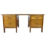 A mid to late 20th century mahogany twin pedestal desk, with four drawers, 173 by 83.5 by 77cm high.