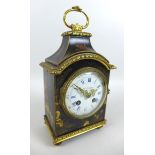 An Edwardian Waring & Gillows retailed chinoiserie mantel clock, with eight day movement chiming