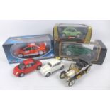 A collection of six model cars, comprising Franklin Mint 1:24, 1967 Volkswagen Beetle in grey, The