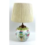 A Chinese Qing Dynasty, 19th century, famille rose ginger jar, later converted to a lamp, the