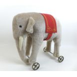 A limited edition Steiff Elephant on wheels, replica of 1903/04 model in grey, edition 34/1000,