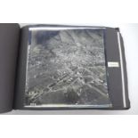 A WWII photograph album containing approximately 472 images taken by Captain Edward Phillips,