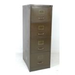 A vintage Art Metal four drawer filing cabinet, dark green, decal maker's label to top, 62.5 by 45
