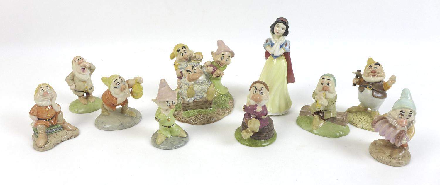 A group of Beswick Snow White & the Seven Dwarf figurines, comprising Snow White SW9, Happy SW12,