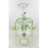 A Victorian epergne, each green vaseline glass flutes with applied glass serpent decoration,