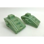 A pair of Carlton Ware WWI Mark IV style tanks, with green glaze, printed factory marks to bases,