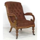 A Victorian button backed mahogany framed open armchair, with brown velvet upholstered seat, back