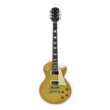 A 2002 Epiphone by Gibson, Les Paul electric guitar in lemon burst with repaired headstock,