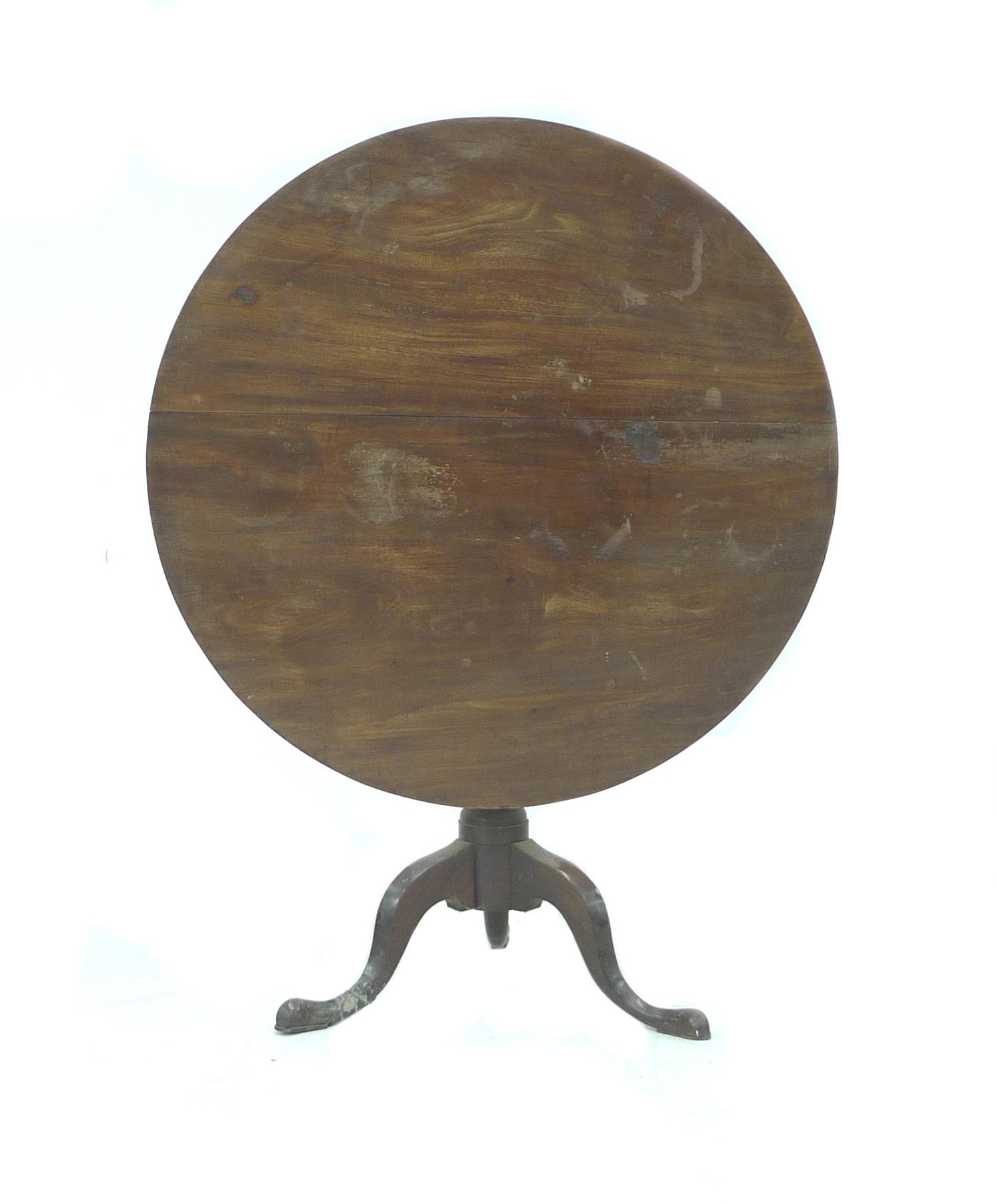 A Georgian mahogany tea table, circular tilt up, raised on a turned column and three cabriole - Image 2 of 3