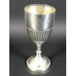 A Victorian silver trophy goblet, with reeded lower body and circular base with beaded decoration, D