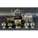 An Art Deco silver plated four piece tea and coffee service, comprising coffee pot complete with