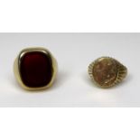 A 9ct gold signet ring set with a carnelian, 16 by 14mm, size P, 12.7g, together with a further