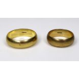 A pair of 9ct gold wedding bands, size R and size Z, both maker ZHG, total combined weight 12.8g. (