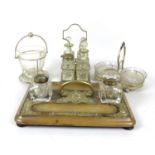 A group of EPNS and glass table items, comprising an engraved glass tea mixing bowl in stand, 11