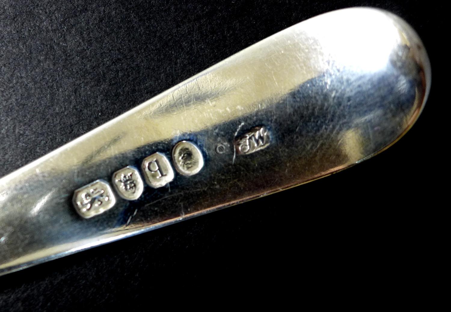 A collection of seven George III silver tablespoons, comprising two with transitional rat tail - Image 7 of 7