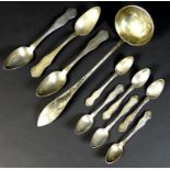 A group of German silver spoons, late 19th century, comprising a ladle, 5.75toz, 35cm long, and a