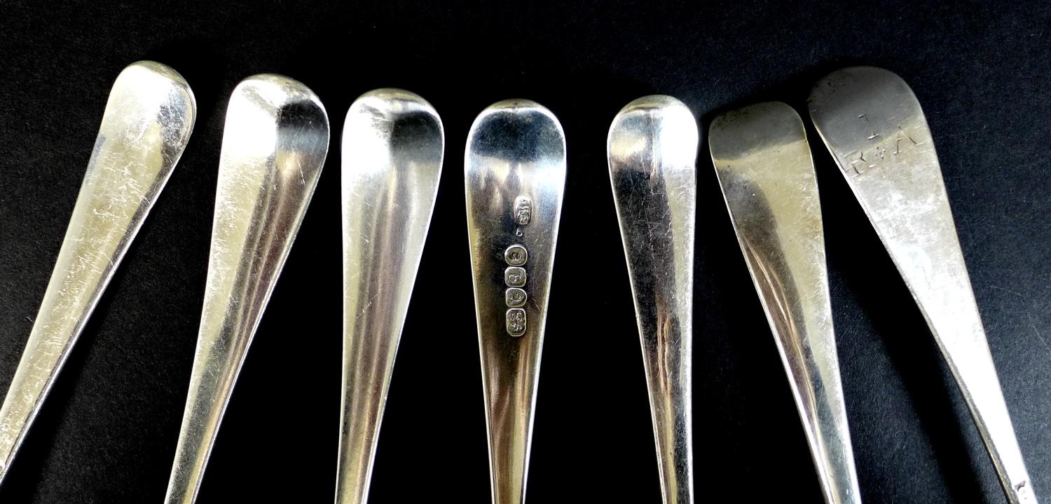 A collection of seven George III silver tablespoons, comprising two with transitional rat tail - Image 4 of 7