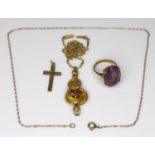 A Victorian 15ct gold pendant necklace, of scrolled design set to the centre with two garnets