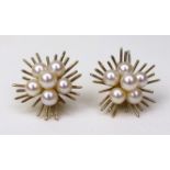 A pair of vintage 9ct yellow gold and pearl ear clips, of sunburst form centred by a cluster of