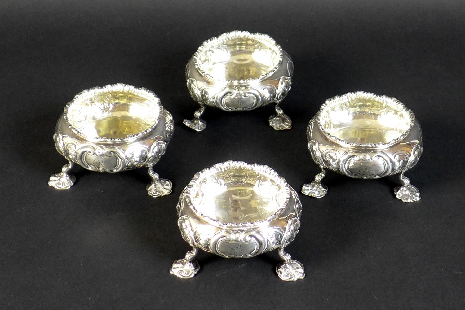 A set of four Victorian silver cauldron salts, each engraved with a single 'R' to one side and