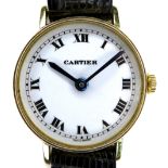 A Cartier 18K gold cased lady's wristwatch, circa 1990, circular white dial with black Roman